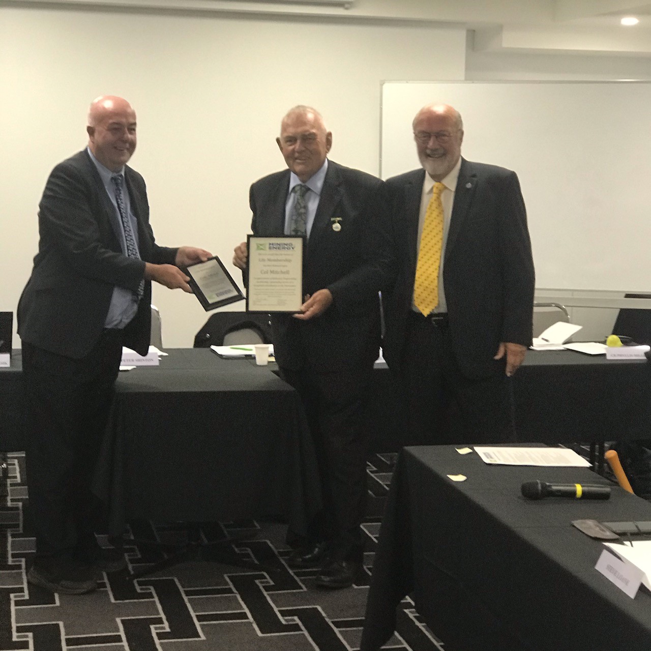 Col Mitchell receiving Life Membership from Chair Cr Peter Shinton and Cr Michael Banasik at Ordinary Meeting 5th March 2020.